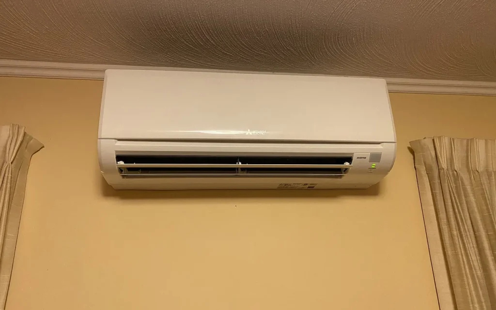 A wall-mounted indoor air handler for a ductless heat pump